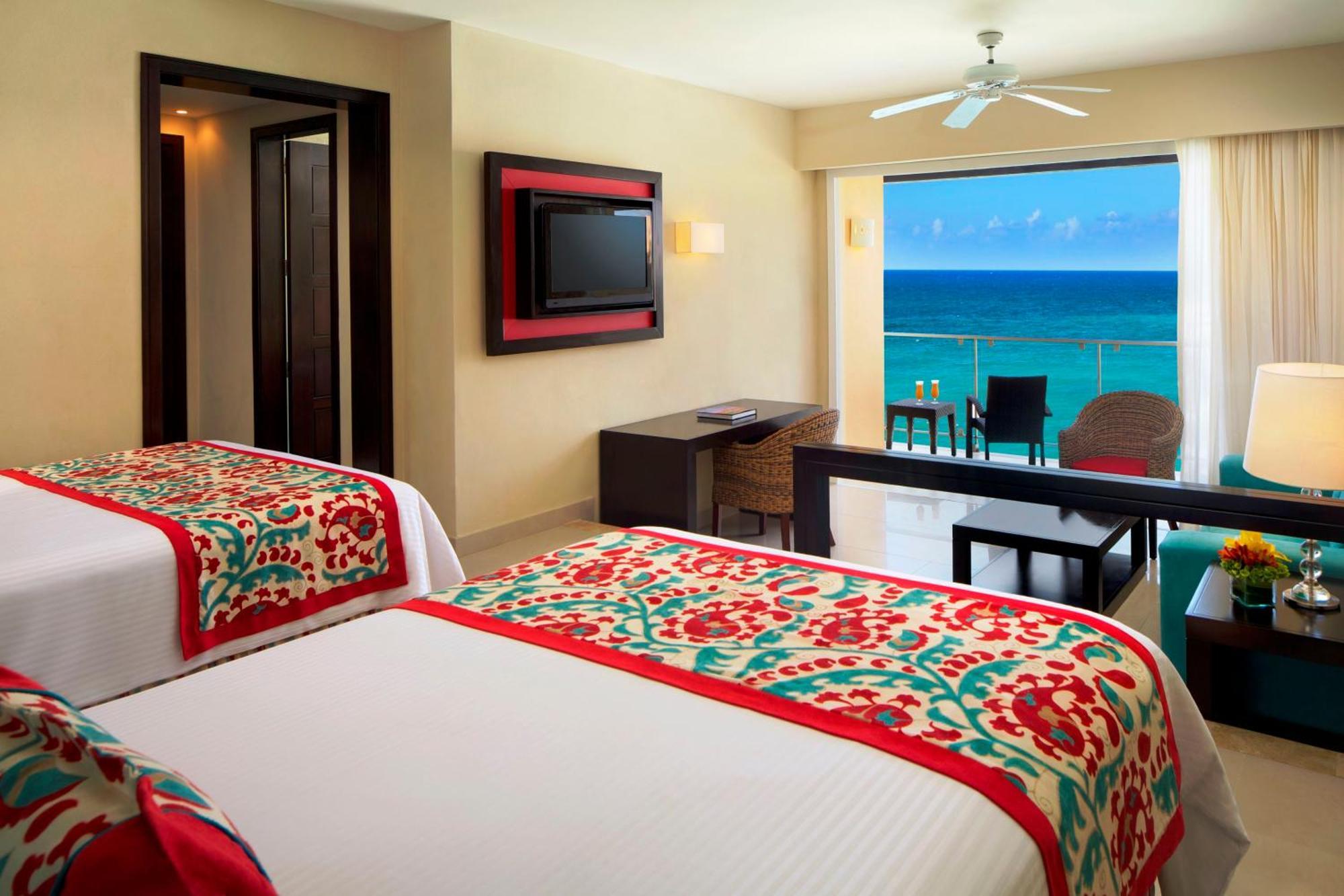 Junior Suite Frente Oceano com 2 Camas de Casal