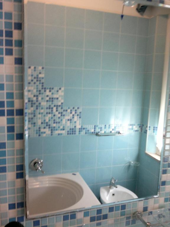 Camera Tripla con Bagno in Comune