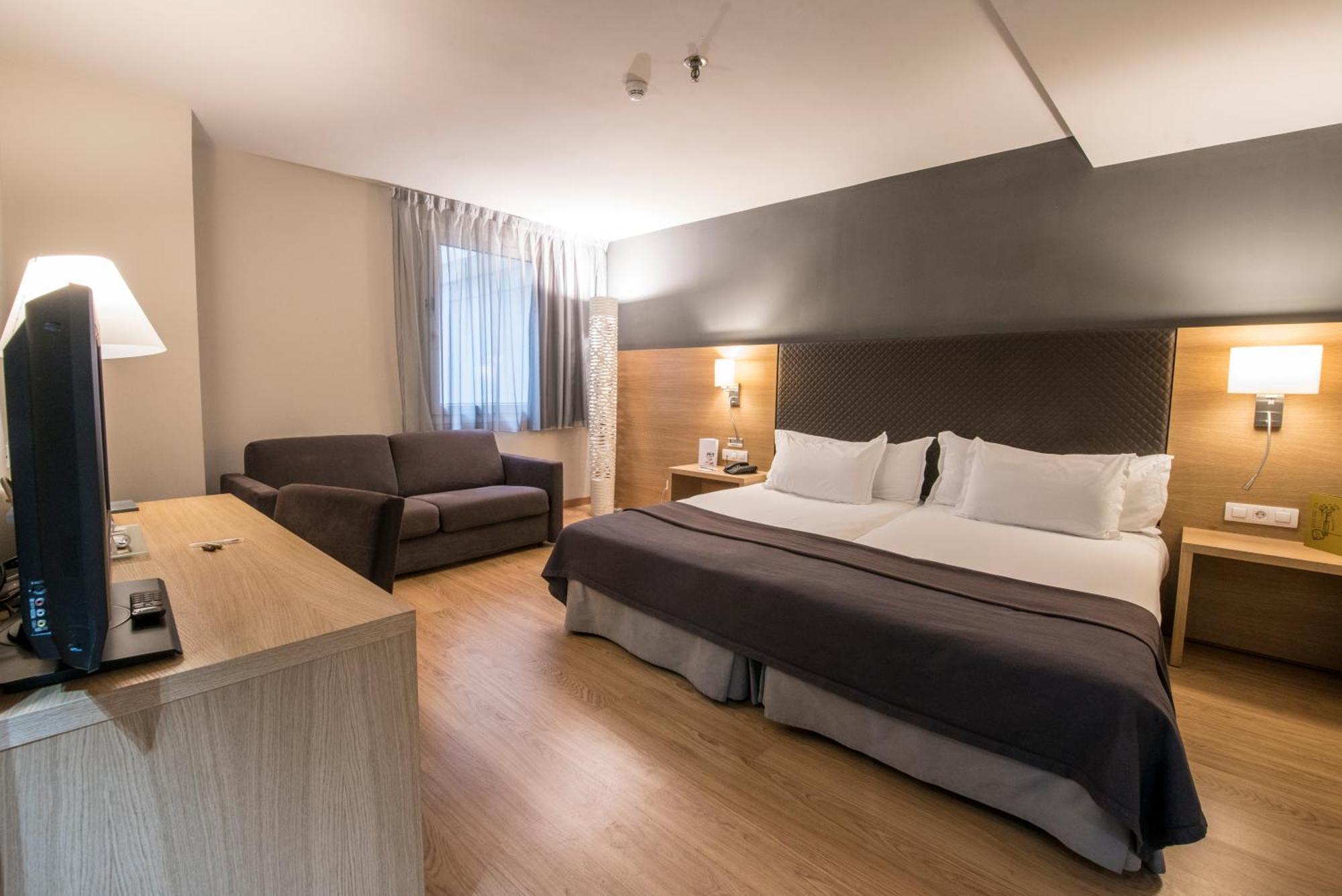 Quarto Standard com Cama de Casal ou 2 de Solteiro e Cama Extra