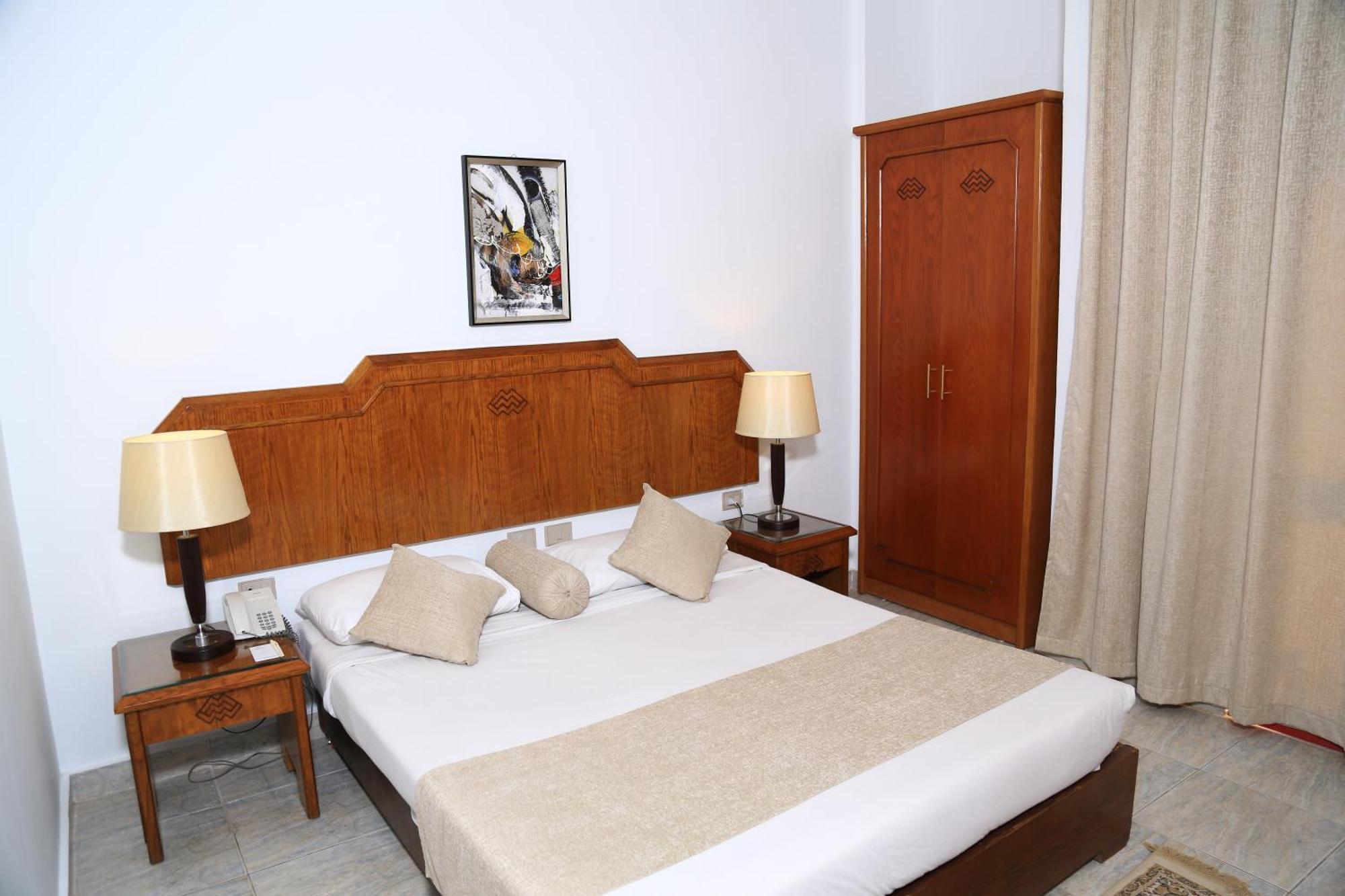 Standard  Triple Room with Partial Sea and Garden View,1280171737:JPEG