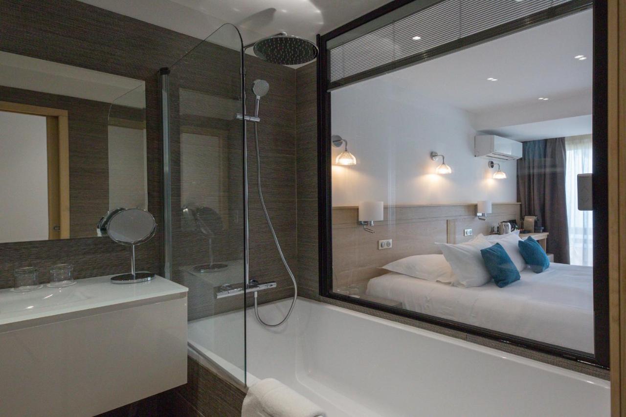 Kamer met balkon en zeezicht