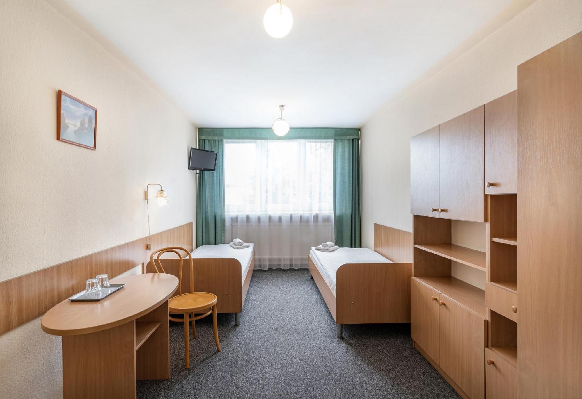 Tweepersoonskamer met Gedeelde Badkamer
