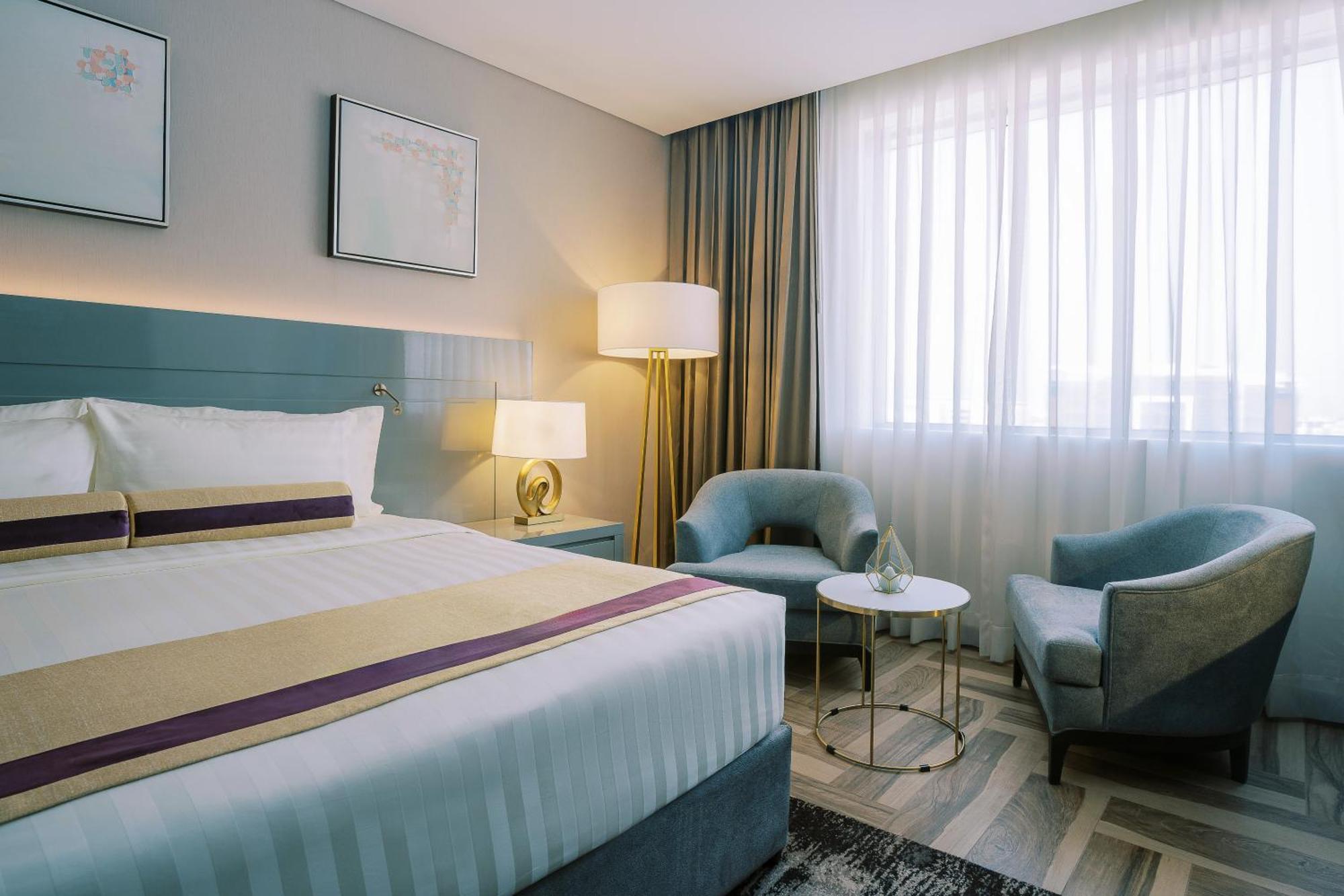 Deluxe King Room with Balcony"