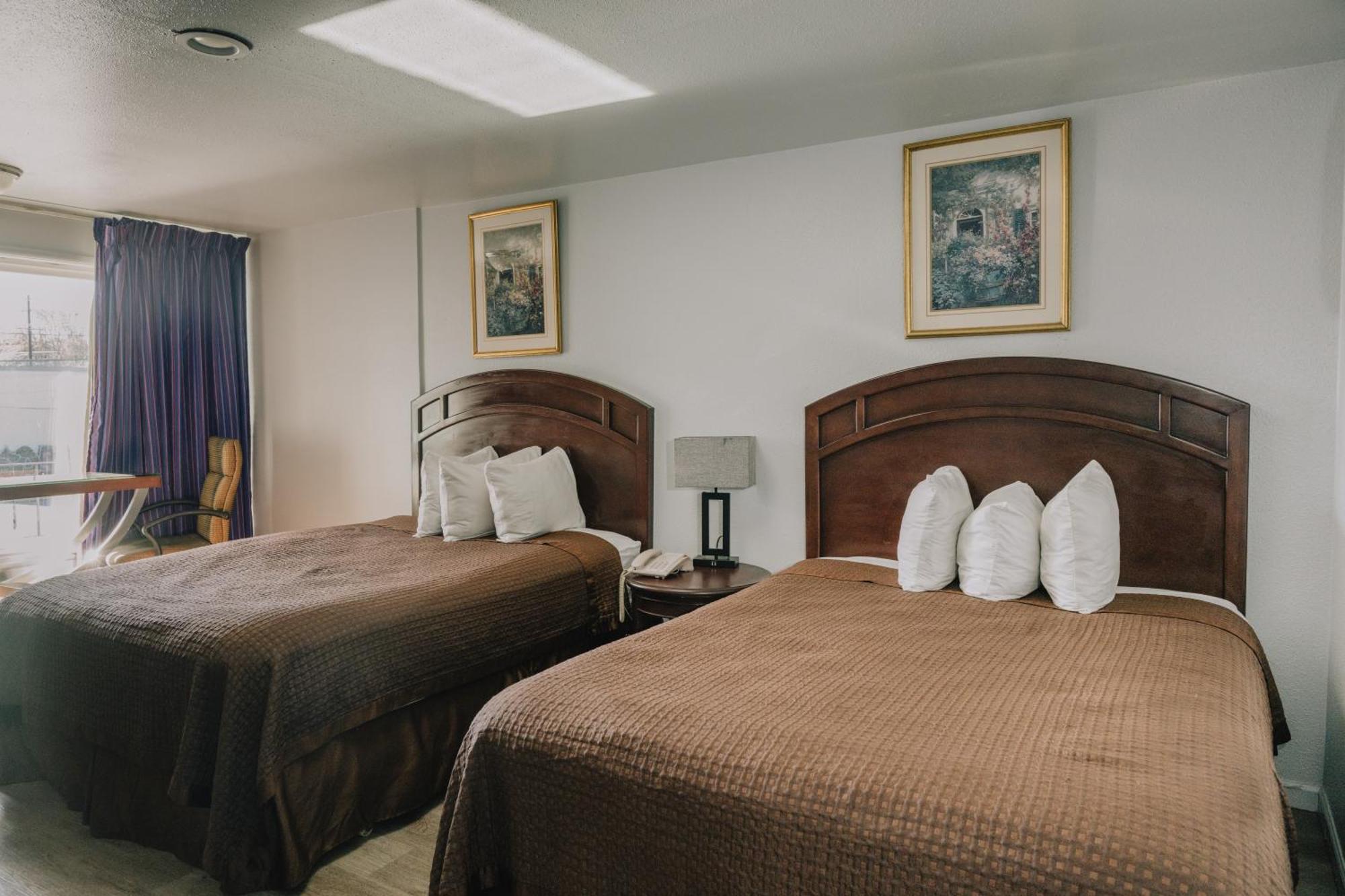 Kamer met 2 Queensize Bedden