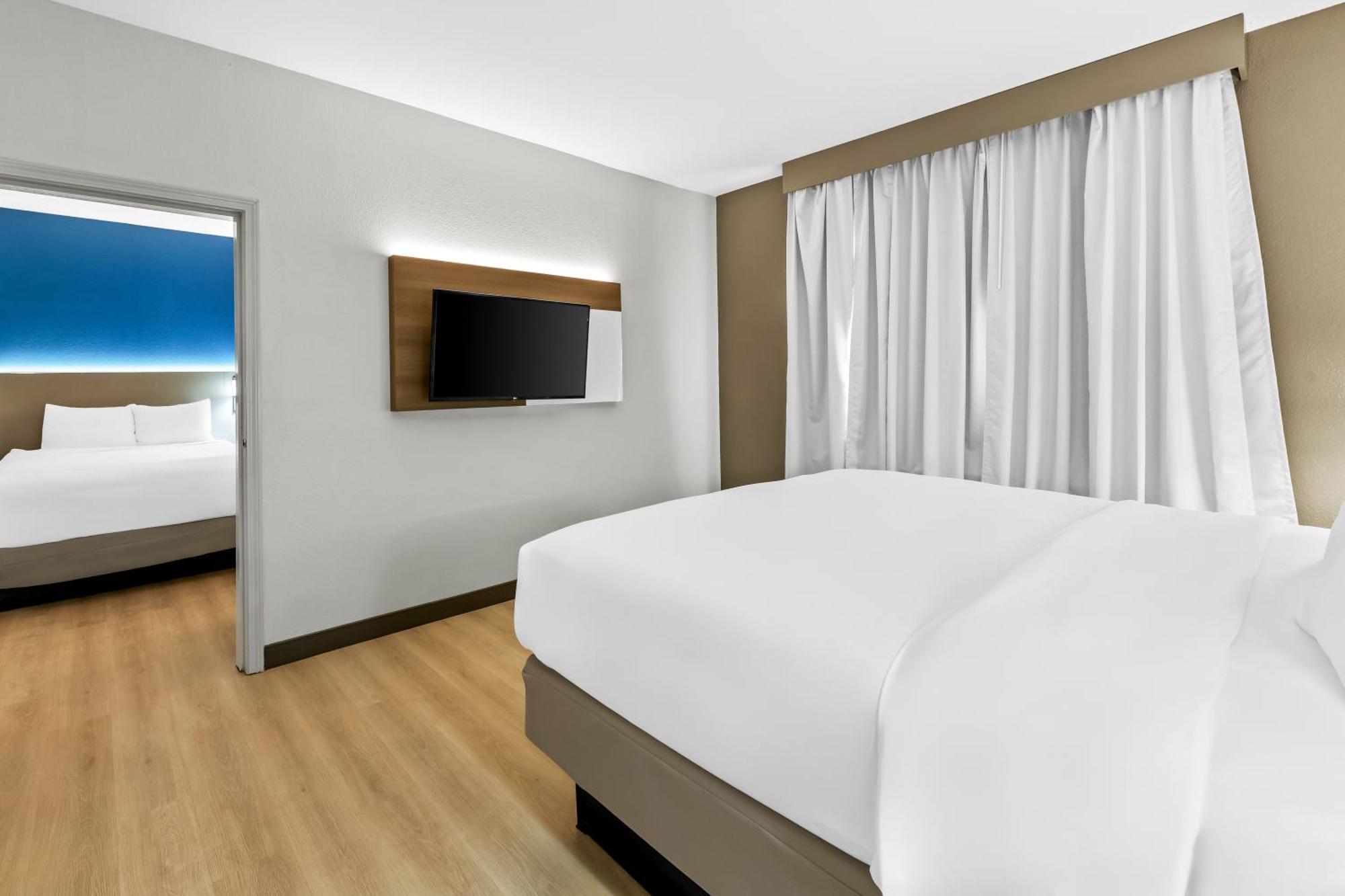 Suite One King Bed Two Queen Beds Accessible or Non-Smoking
