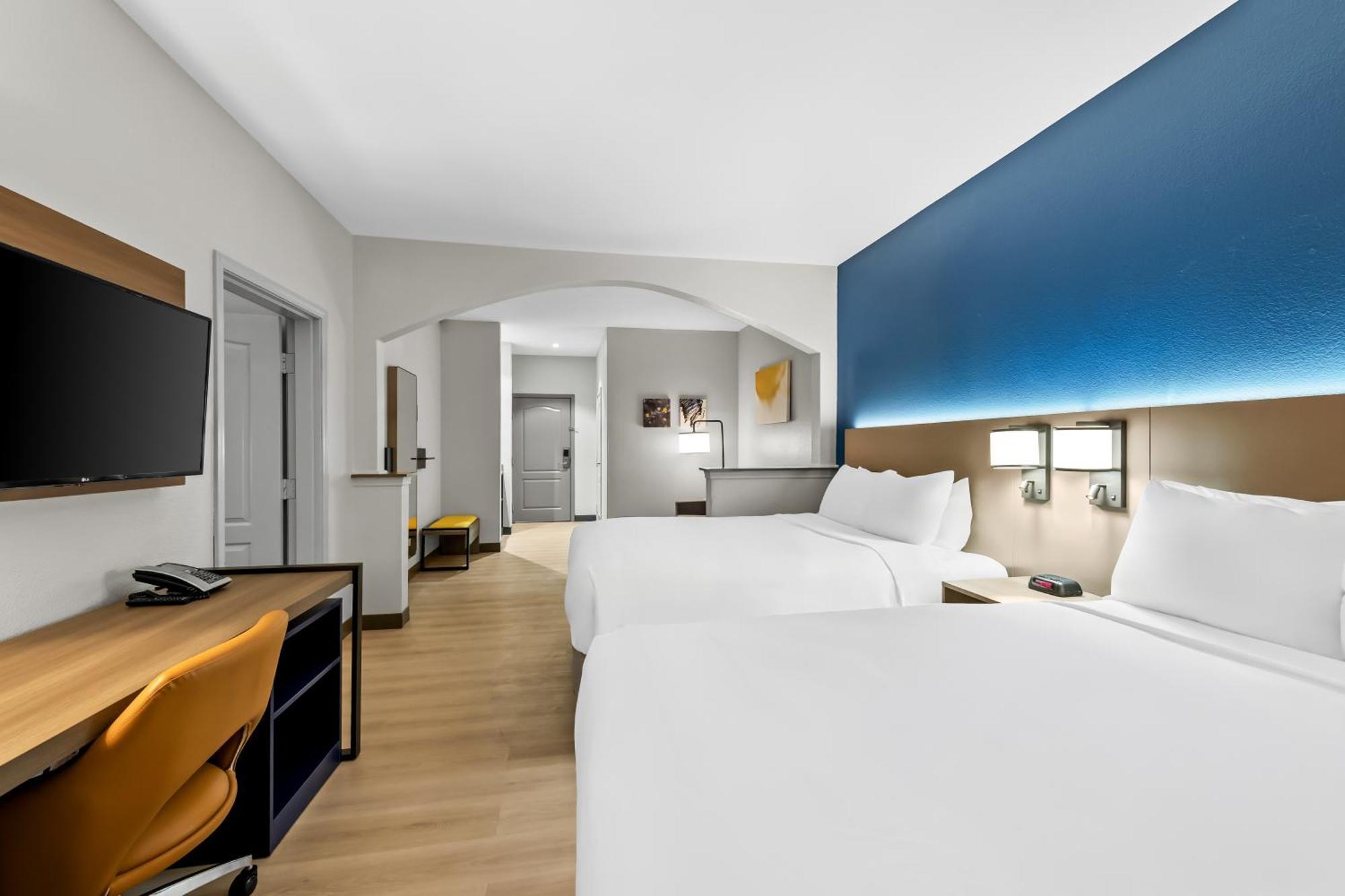 Suite One King Bed Two Queen Beds Accessible or Non-Smoking