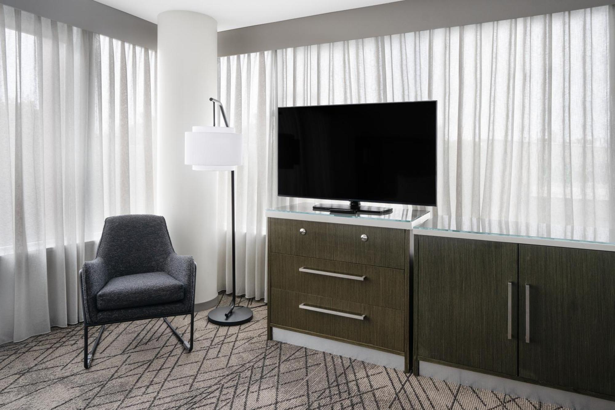 Corner King Room Sofa Bed Accessible Bath Tub Mobility Accessible