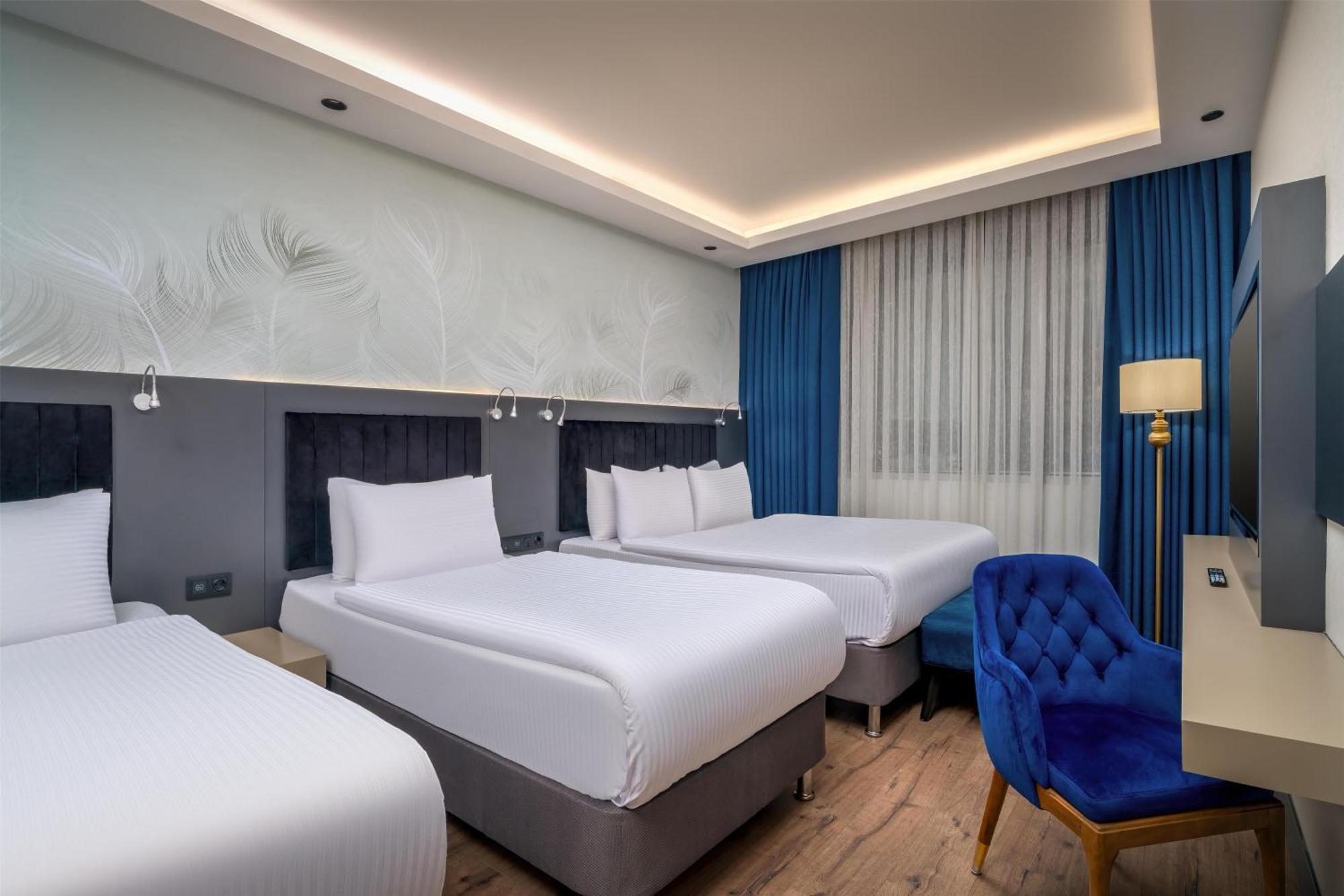 Superior Room One Double Two Single Beds Non-Smoking