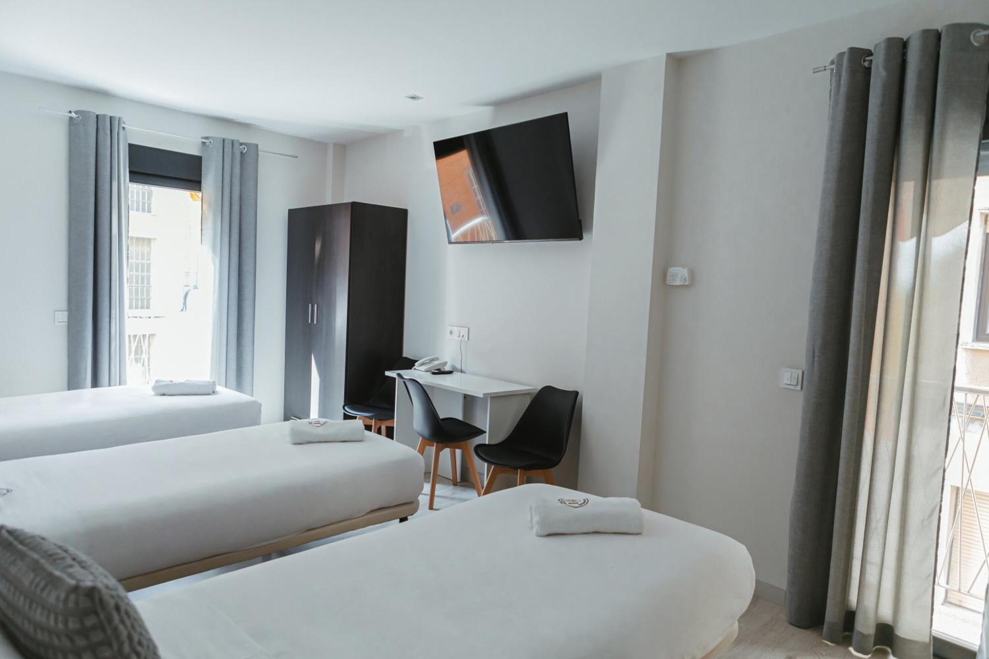 Habitación Triple con balcón
