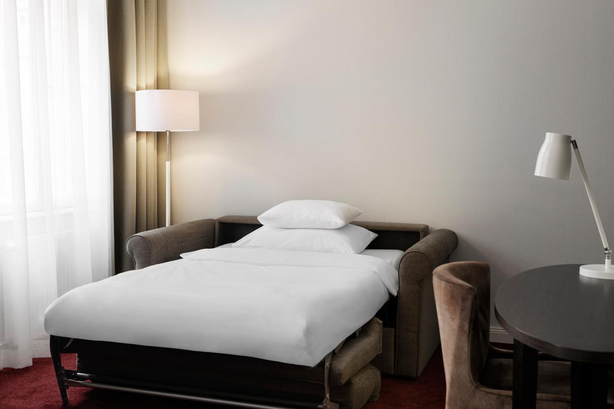 Deluxe Room with Queen Bed and Sofa Bed