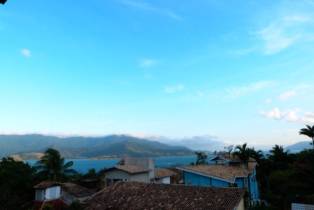 Quarto Triplo com Vista para a Piscina