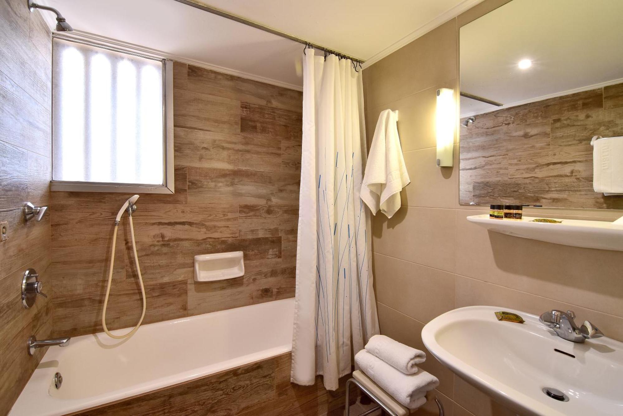 Premium One-Bedroom Apartment with Side Sea View