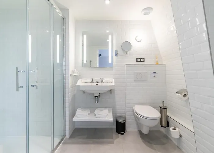 Hôtel Échappée en Baie - Chambres climatisées -Parking privé gratuit dont forfaits bornes électriques réservable