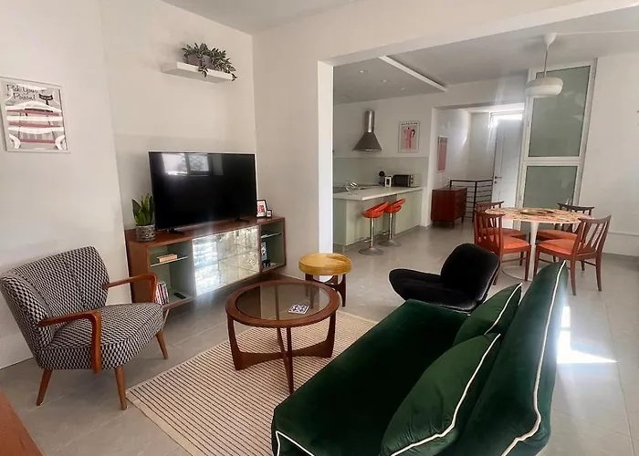 60S-Style Coastal Retreat Minutes From The Beach