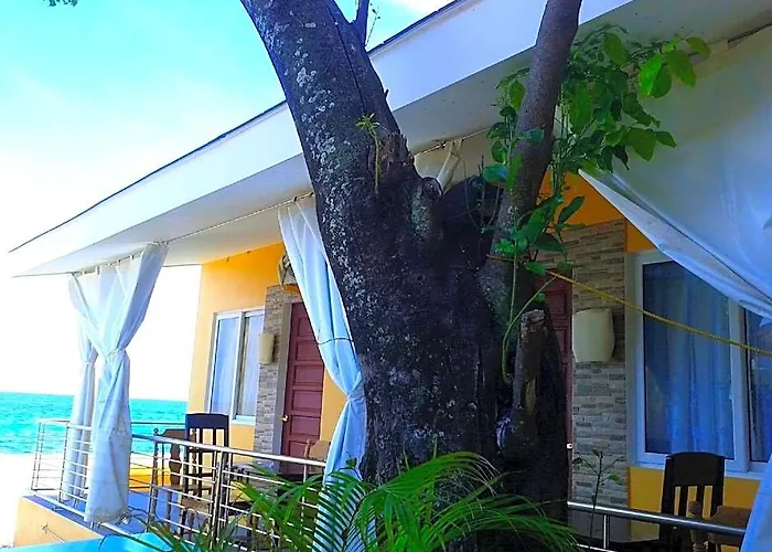 Luzmin Bh - Beachfront Cottages