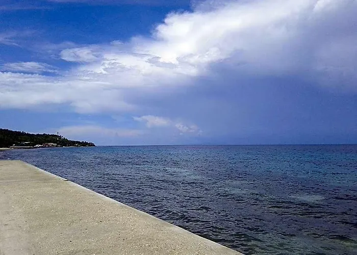 Luzmin Bh - Beachfront Cottages