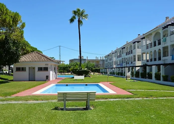 Apartamento con terraza privada y piscinas